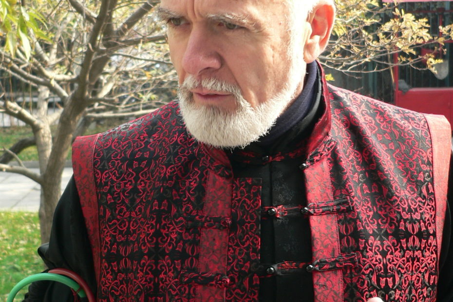 David N. Tool wearing a red vest