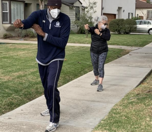 (Victor Wilson (left) in a Tai Chi session with Karen Koblitz (right).